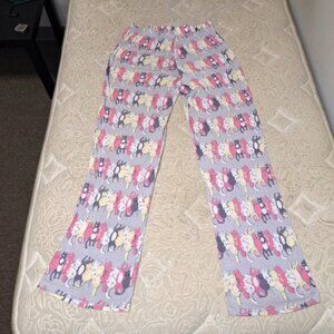 A pair of nitenite munki munki ladies small pajamas with a sleeping cats pattern